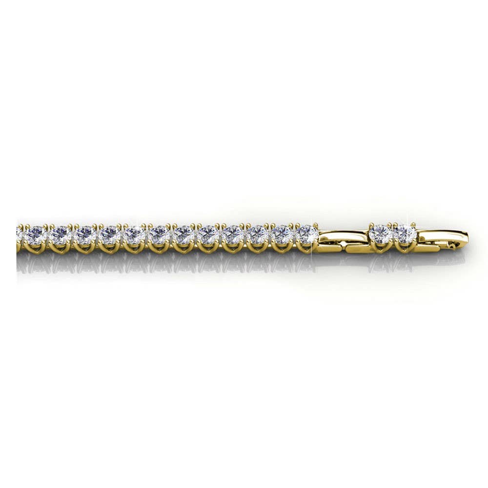Gold bracelet with diamonds on a white background
