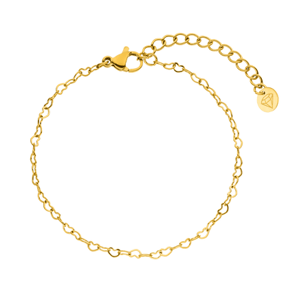 Gold-toned heart chain bracelet from Unlimited with lobster claw clasp and diamond-shaped charm.
