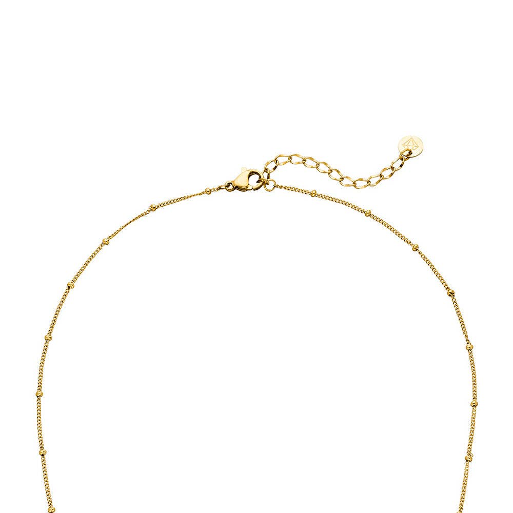 Gold beaded necklace by an unidentifed brand with lobster clasp and extension chain.