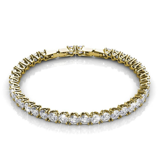 Gold bracelet with clear gemstones on a white background
