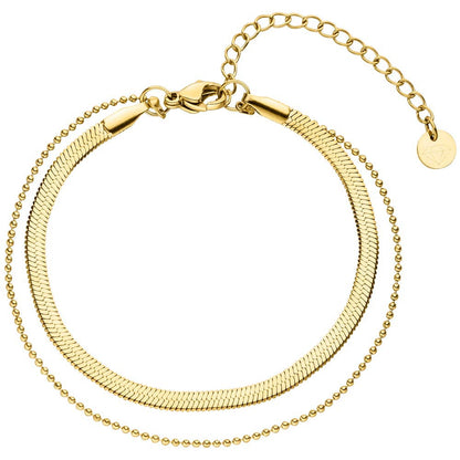 Gold-tone layered bracelet by "" with a herringbone chain and beaded chain.
