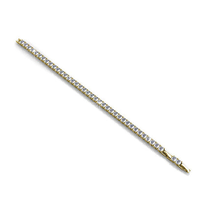 Gold bracelet with clear gemstones on a white background