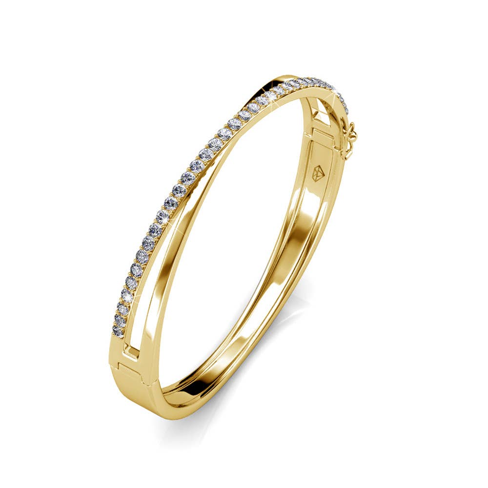 Gold bracelet with diamond accents on a white background