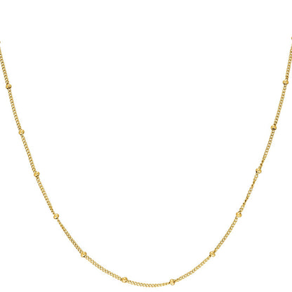 Fine beaded necklace in yellow gold featuring small round beads strung along the chain.
