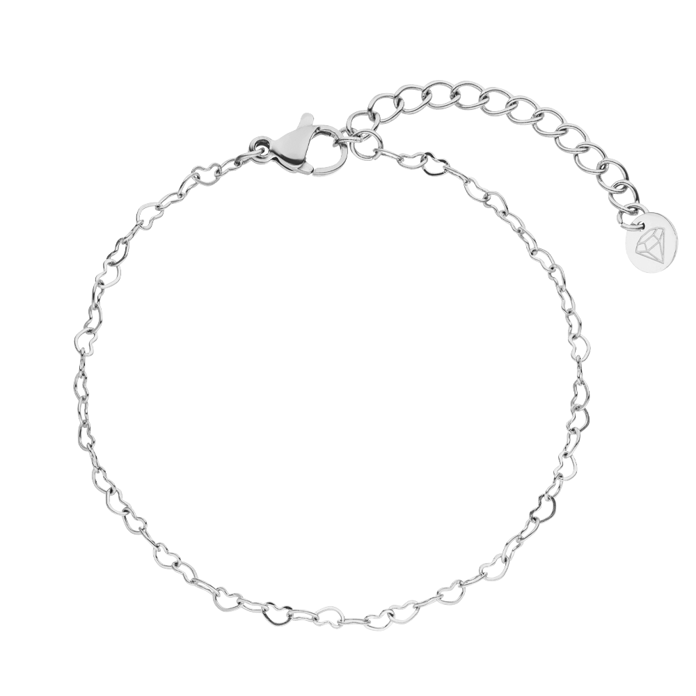 Silver heart chain bracelet by Unlimited, featuring a lobster clasp and extension chain.