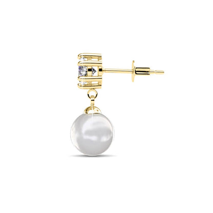 Gold earring with a pearl and clear gemstone on a white background